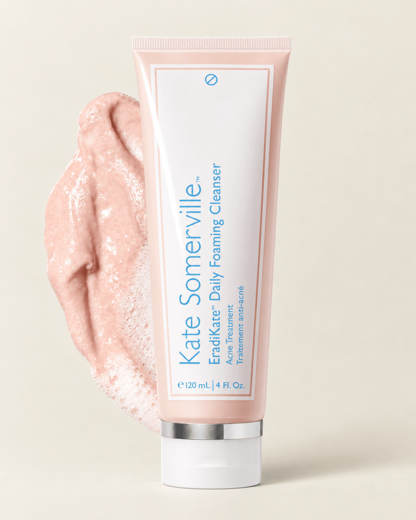 Kate Somerville EradiKate Daily Foaming Cleanser on a soft neutral background.